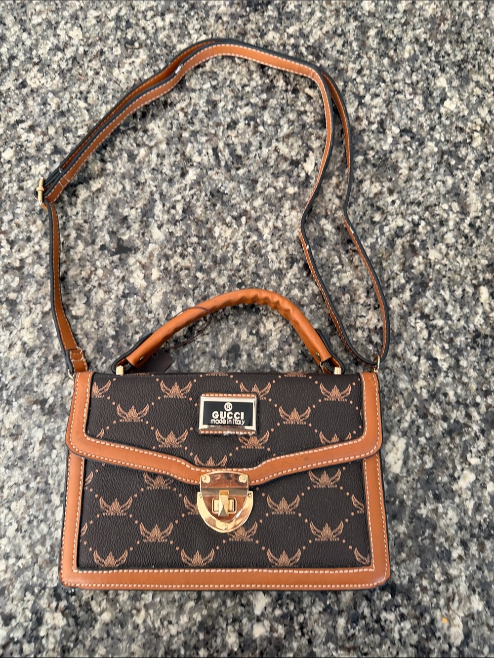 Gucci Brown and Tan Logo-Print Top Handle Satchel.